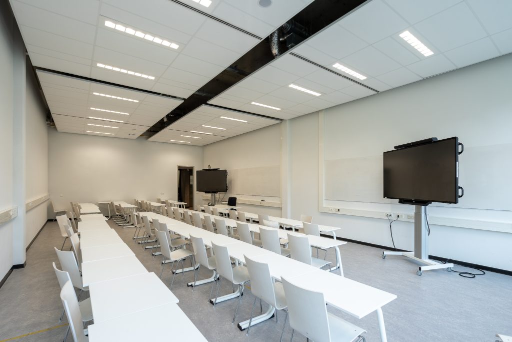 A conference room with televisions for presentations